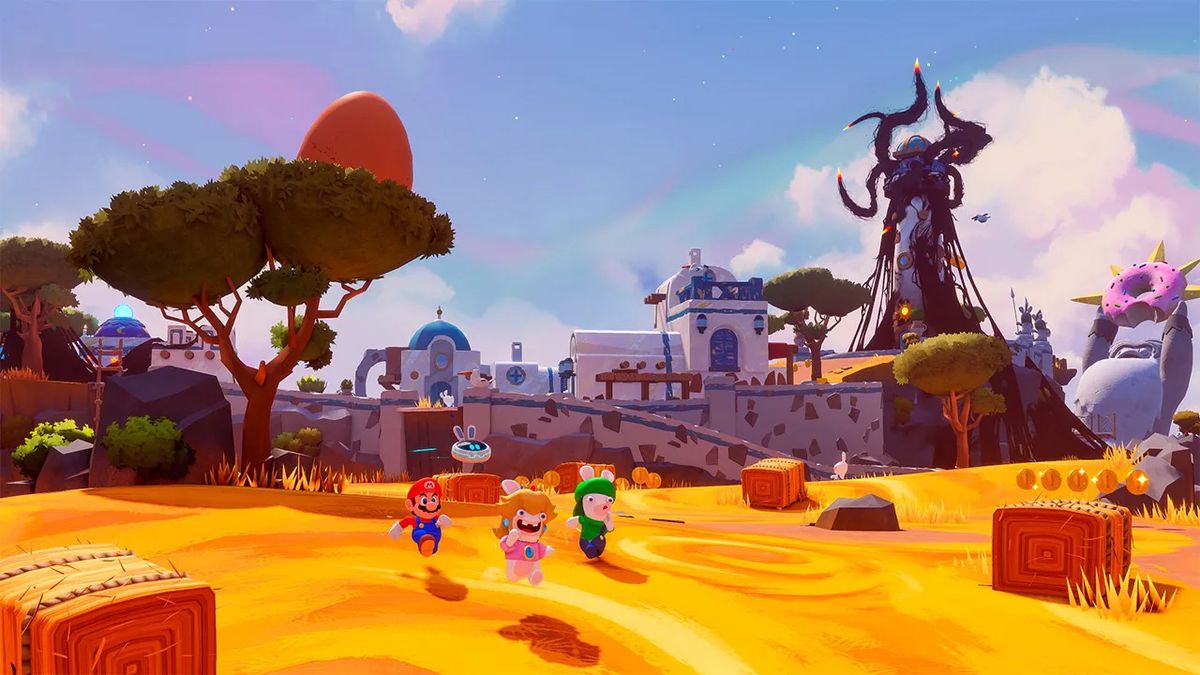 Rabbid Peach, Rabbid Luigi en Mario rennen over een gouden veld in Mario + Rabbids Sparks of Hope